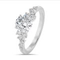 1.50 carat solitaire cluster ring in white gold with a round diamond