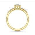 1.50 carat solitaire cluster ring in yellow gold with marquise diamond