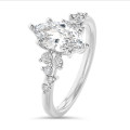 2.00 carat solitaire cluster ring in white gold with marquise diamond