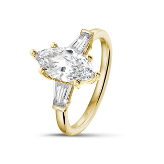 3.00 carat trilogy ring in yellow gold with lab grown marquise diamond and lab grown tapered baguettes