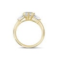 3.00 carat trilogy ring in yellow gold with lab grown marquise diamond and lab grown tapered baguettes