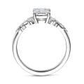 1.00 carat solitaire cluster ring in white gold with a radiant cut diamond