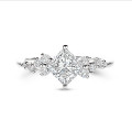 1.20 carat solitaire cluster ring in white gold with a princess cut diamond
