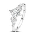 1.50 carat solitaire cluster ring in white gold with a princess cut diamond