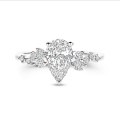 1.20 carat solitaire cluster ring in white gold with a pear cut diamond