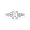 2.00 carat solitaire cluster ring in white gold with an emerald cut diamond

