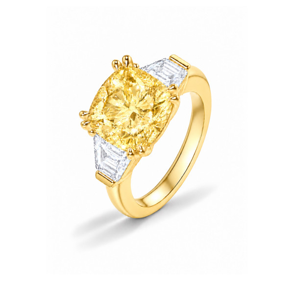 Bespoke trilogy ring with a yellow cushion cut diamond