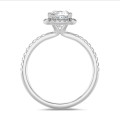 1.00 carats bague solitaire de type auréole avec un diamant synthétique coussin en or blanc avec diamants synthétiques ronds