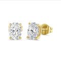4.00 carats boucles d'oreilles solitaire en or jaune avec diamant de laboratoire ovale