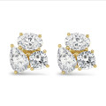 6.00 carats Boucles d'oreilles trilogie en or jaune