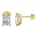 Orecchini solitari da 3,00 carati in oro giallo con diamanti sintetici taglio brillante
