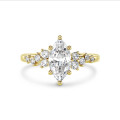 1.00 carat solitaire cluster ring in yellow gold with marquise diamond