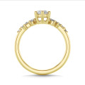 1.20 carat solitaire cluster ring in yellow gold with marquise diamond
