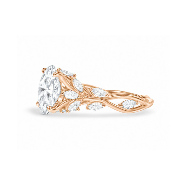 葉のついた枝をモチーフにしたバンドに、オーバルカットのダイヤモンドをあしらった、自然からインスピレーションを得たオーダーメイドの指輪