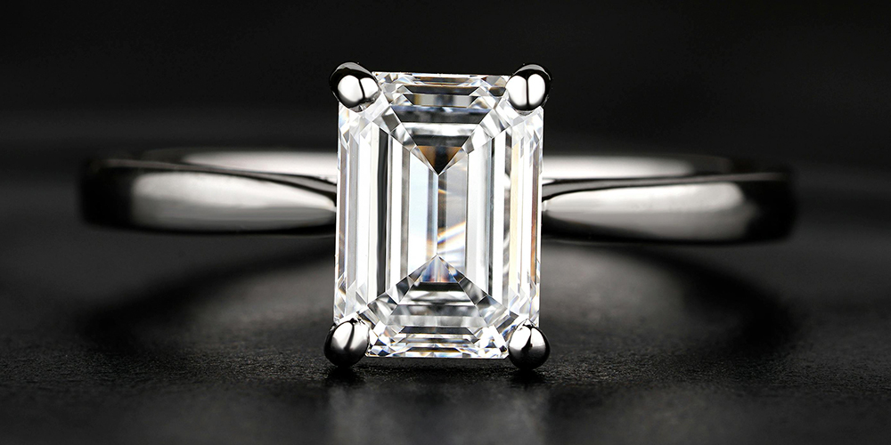 White gold emerald cut engagement ring