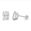 4.00 karaat solitaire oorbellen in wit goud met ovale lab grown diamanten