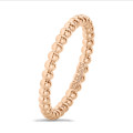 Combinatie ring met bolletjes in rood goud