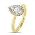 5.00 karaat halo solitaire ring met peervormige lab grown diamant in geel goud met ronde lab grown diamanten