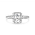 1.50 karaat halo solitaire ring met een lab grown radiant cut diamant in wit goud en ronde lab grown diamanten