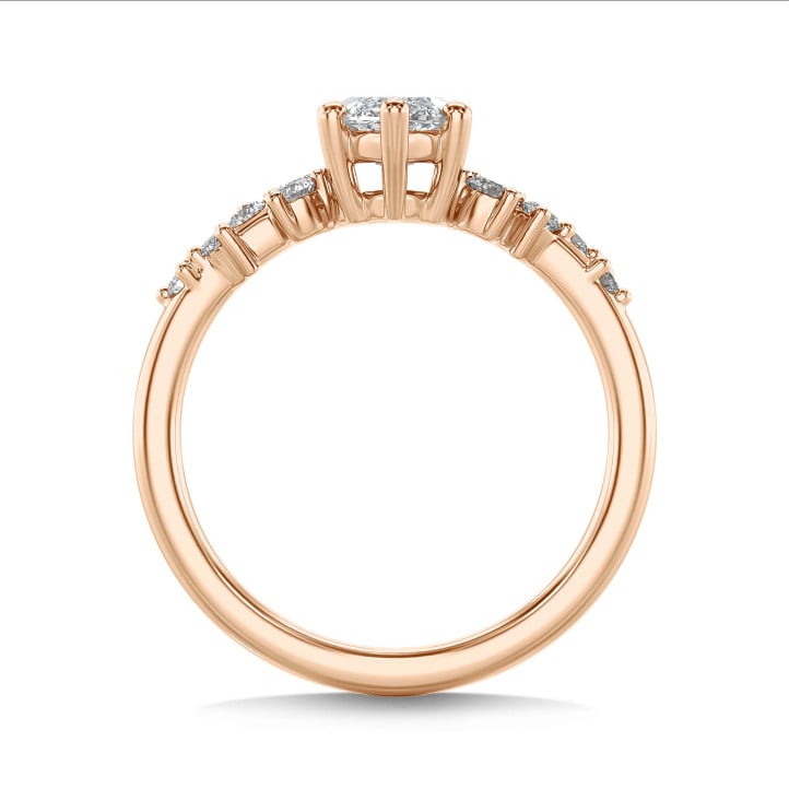 1.20 karaat solitaire clusterring in roodgoud met marquise diamant